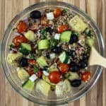 Quinoa and Lentil Salad in a glass bowl.