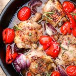 Chicken being cooked in a skillet