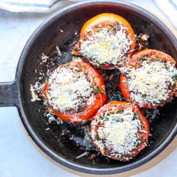 A pan of stuffed tomatoes
