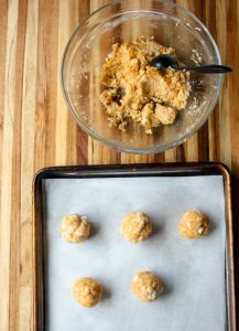 Shaping the mixture into balls.