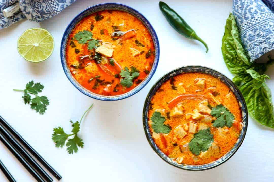 Two bowls of food on a table