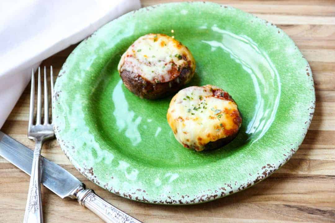 A plate of food sitting on top of a wooden table