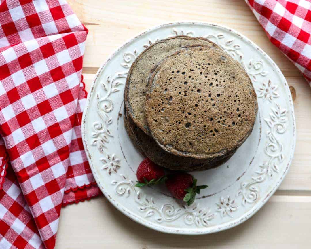Pancakes on a plate with strawberries