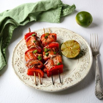 A plate of food on a table, with Salmon