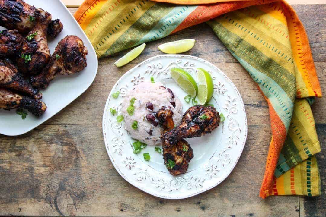 A plate of food on a table, with chicken and rice