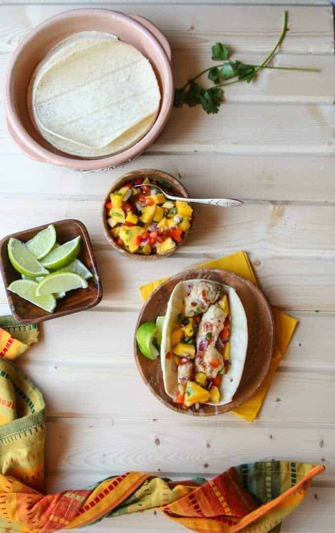 Turkey and Mango Taco with a Dish of Mango Salsa and a Dish of Lime wedges