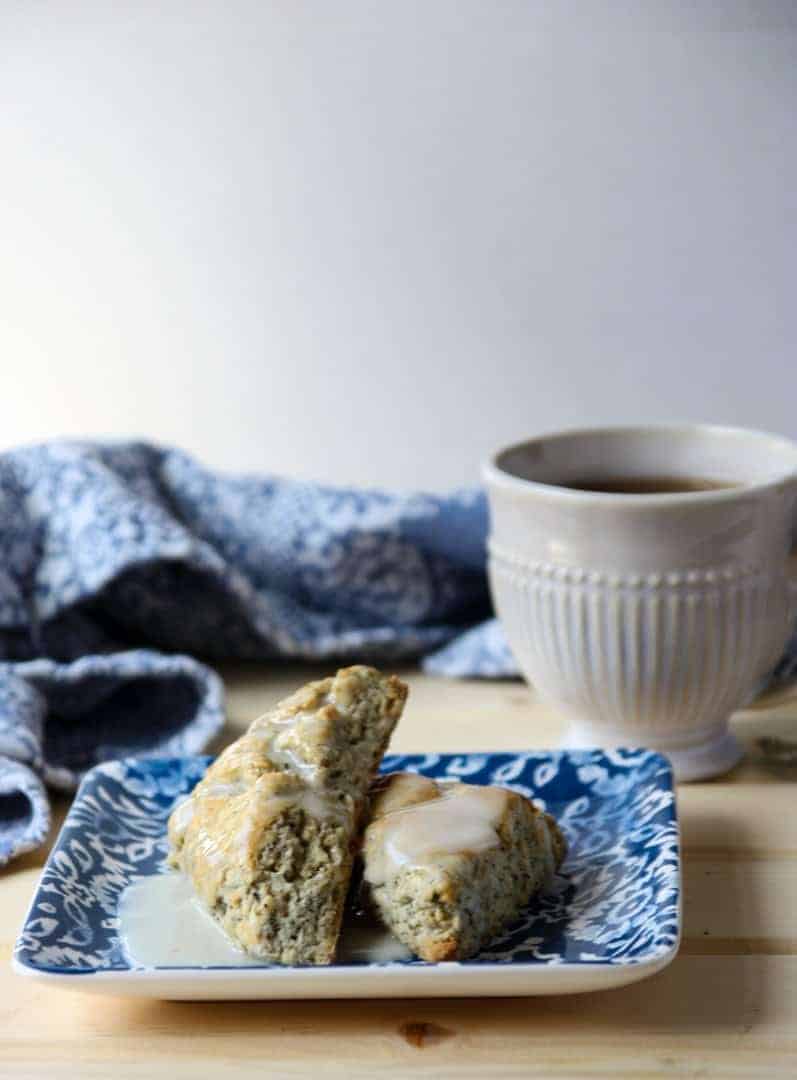 Earl Grey Scones on a plate with a cup of tea