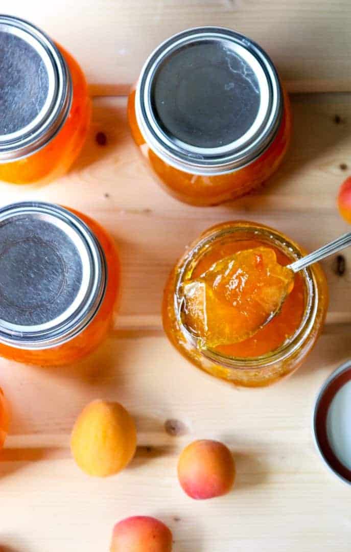 A close up of a spoonful of jam