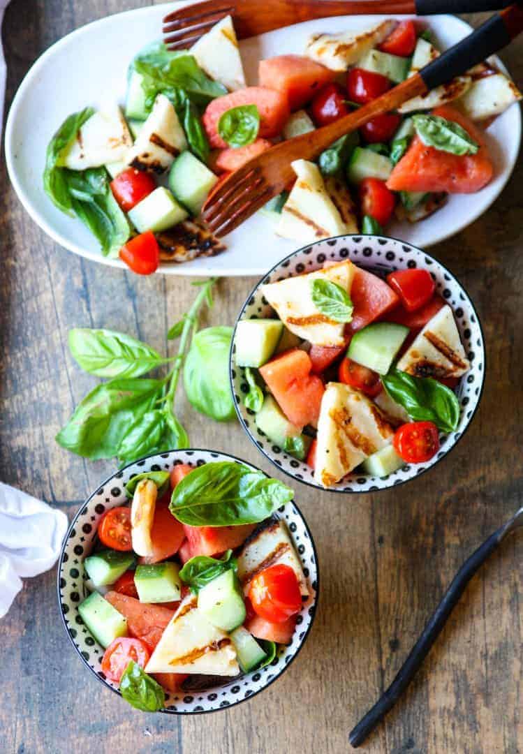Two black & white bowls of Grilled Halloumi & Watermelon Salad