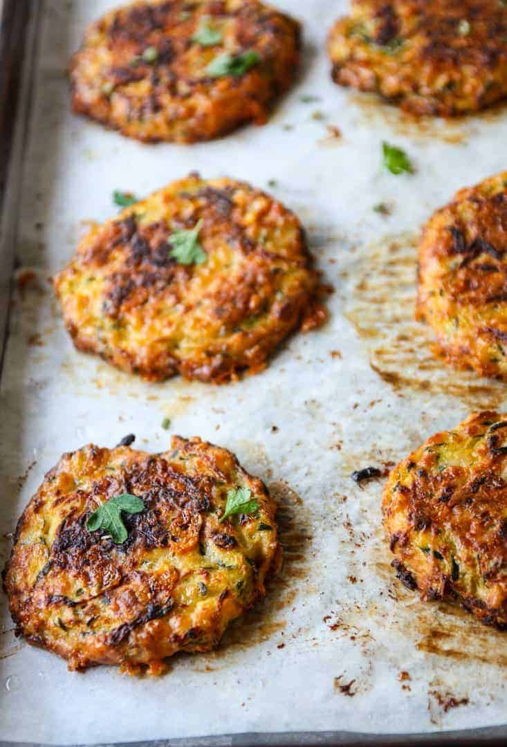 zucchini fritters on a baking sheet