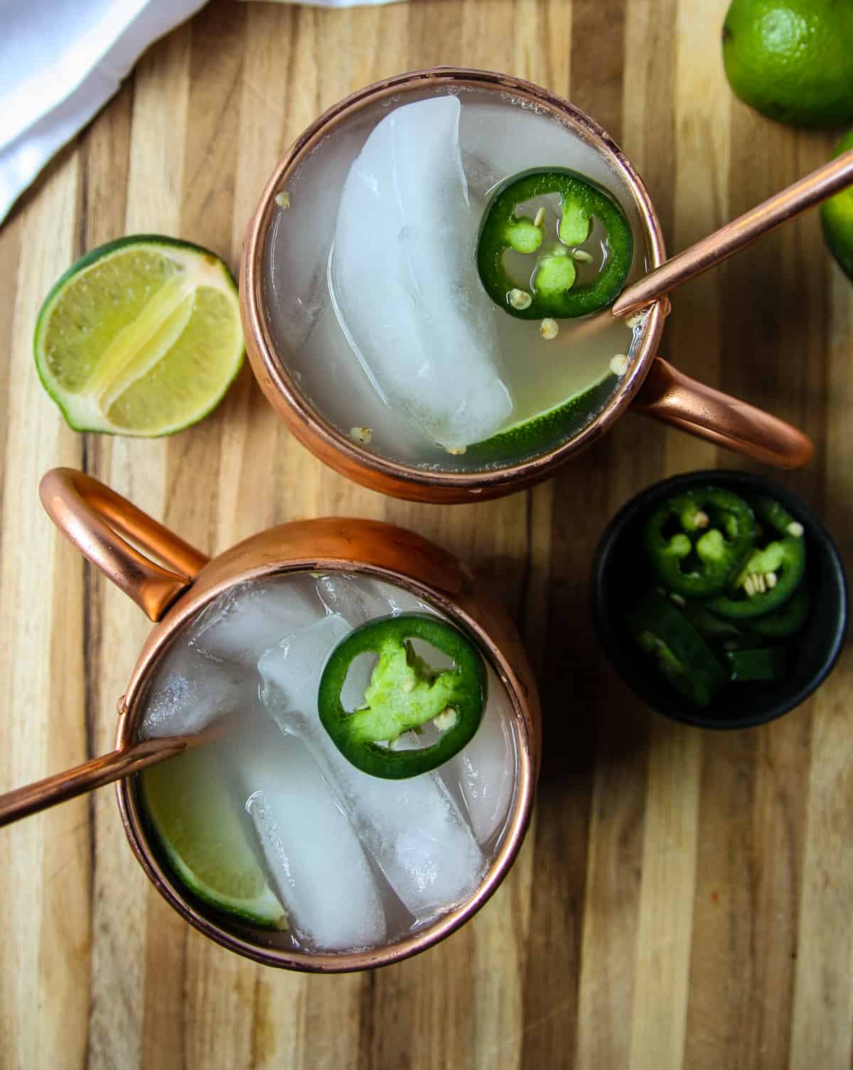 Two Mexican Mule beverages in copper mugs.