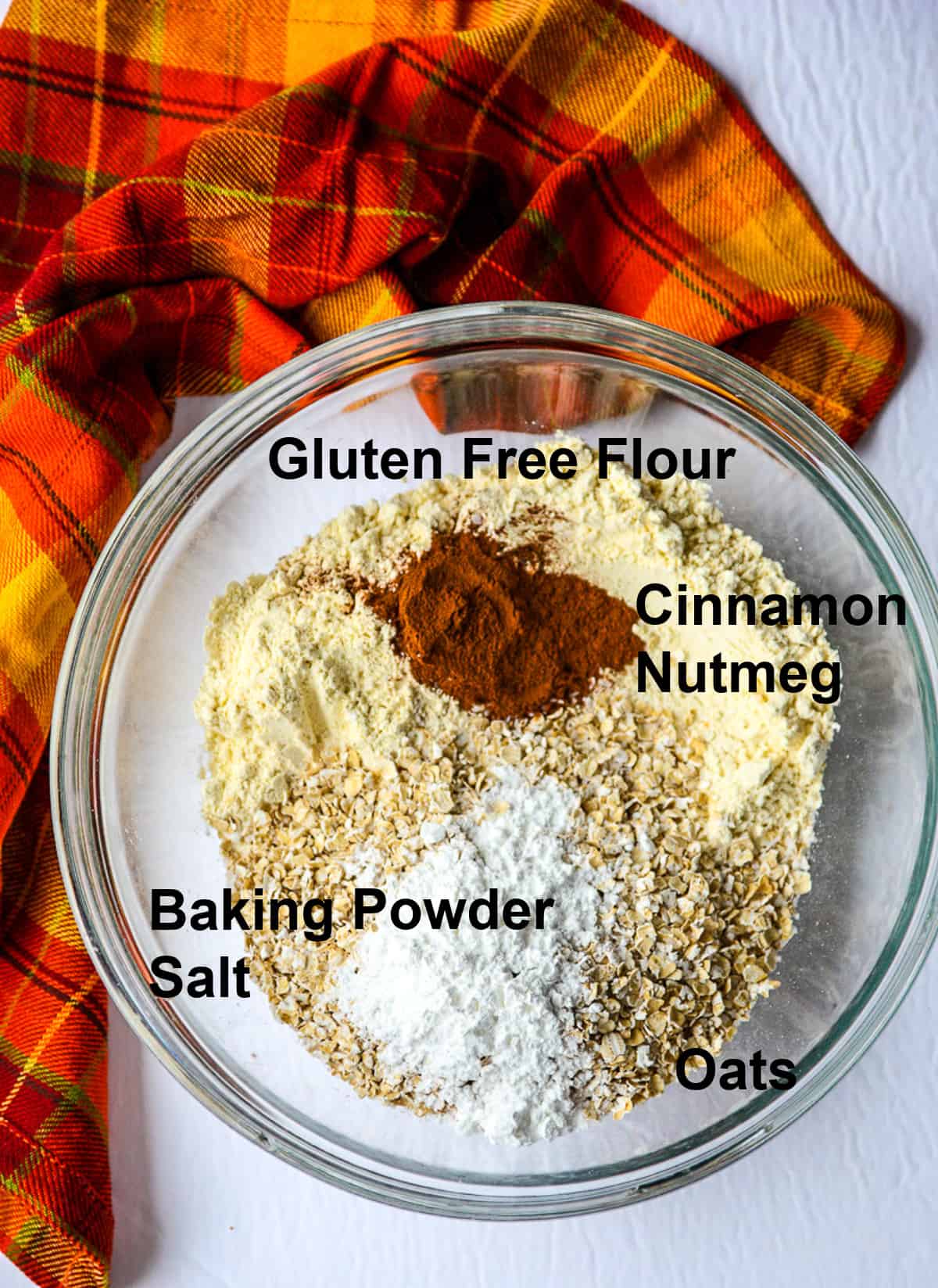 The dry ingredients in a glass bowl.
