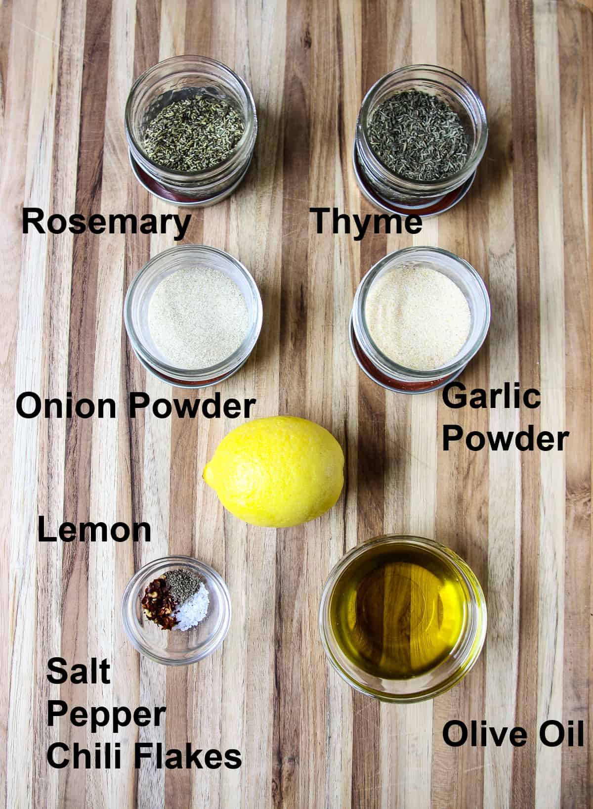 The ingredients for the marinade on a wooden board.