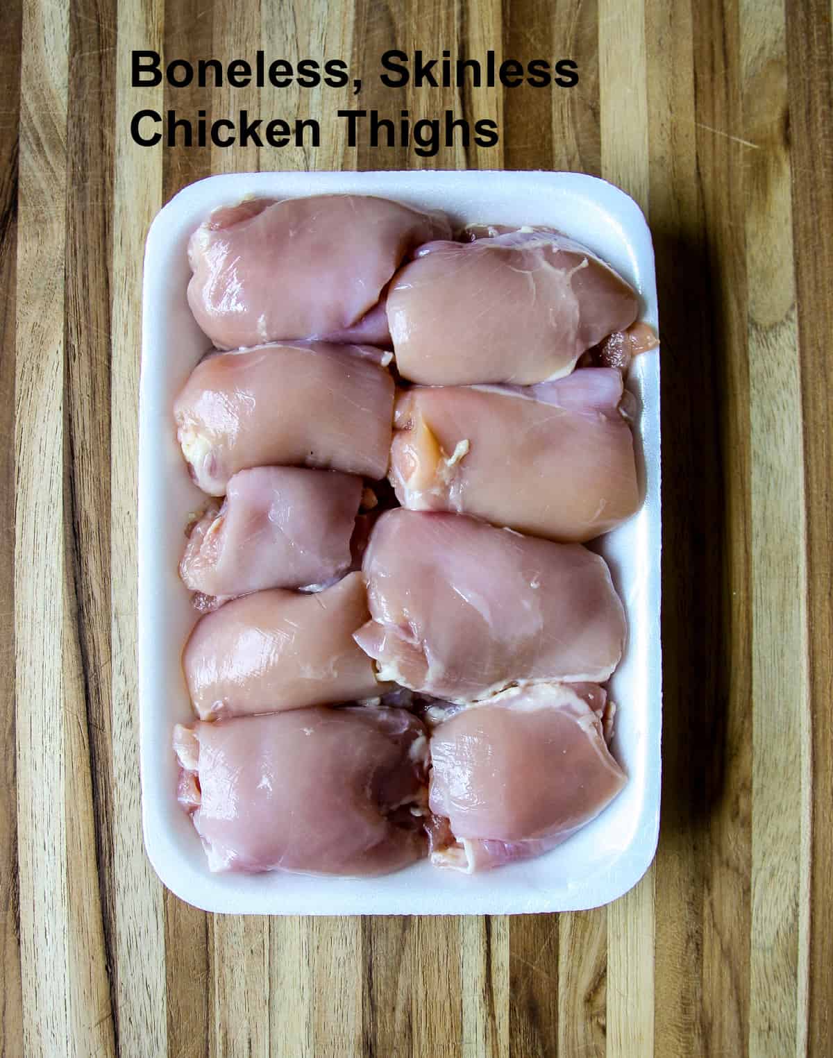 Raw chicken pieces in their package.