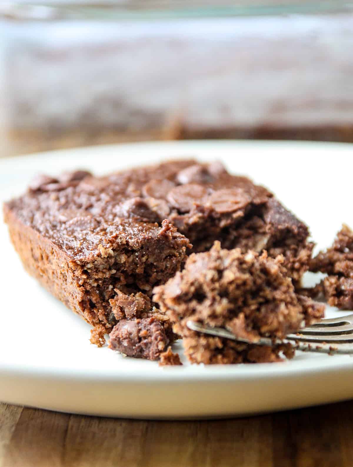 A fork slicing into a serving of baked oats.