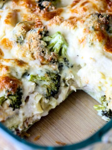 Chicken and broccoli lasagna in a glass baking dish.