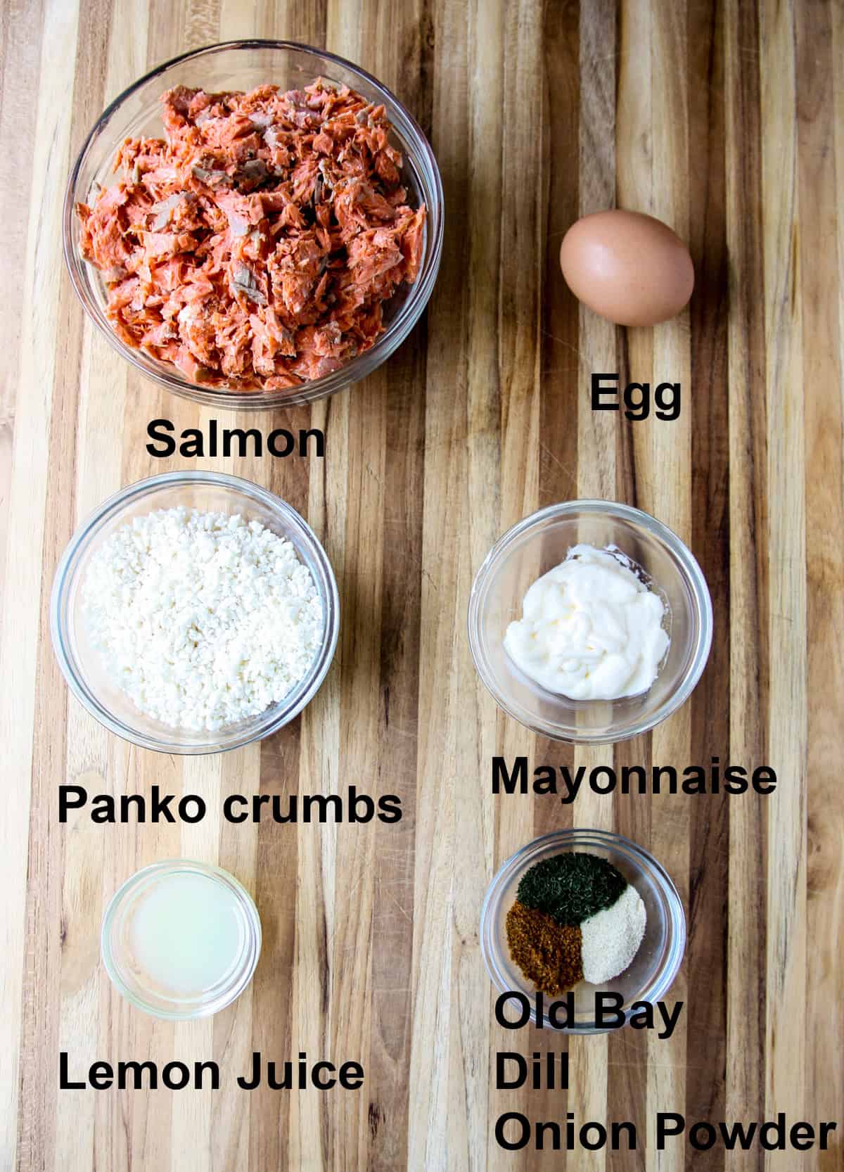 The ingredients for making this recipe in glass bowls on a wooden board.